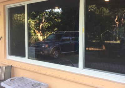 Caki wall of a house in florida keys with impact windows